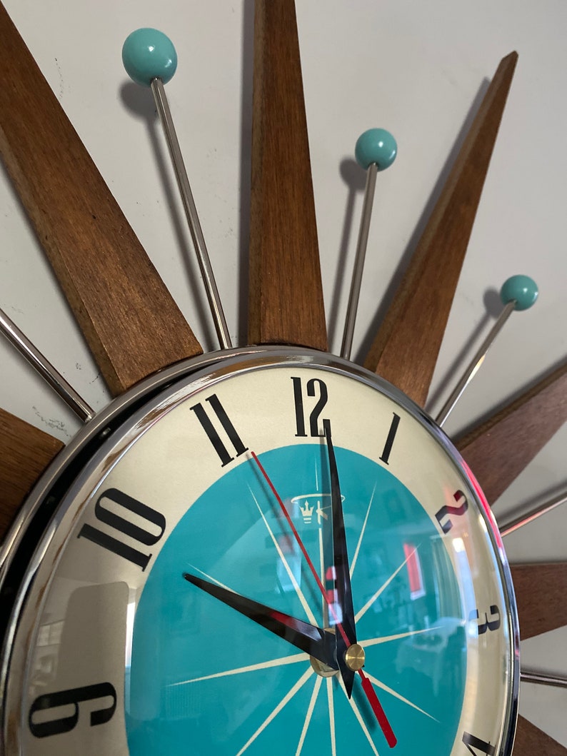 Top Selling Starburst Wall Clock by Royale Mid Century Modern style Chrome Silent Medium Teak Rays Turquoise Face Atomic Balls British Made image 4
