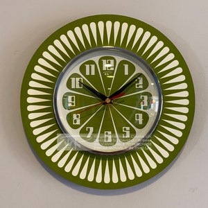 Handmade 1970's style Sunburst Orange Royalexe Wall Clock in Avacado with a Funky Bright Avacado Segment Face from Royale in the UK