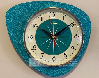 Handmade Asymmetric Queens Gambit style Wall Clock in New Turquoise with Starburst Dial from Royale - Midcentury French Atomic Retro.