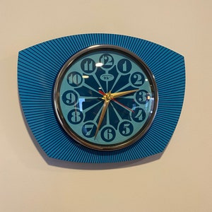 Formica Lucite Asymmetric Wall Clock from Royale - 1970's Retro style in Sea Blue