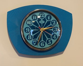 Formica Lucite Asymmetric Wall Clock from Royale - 1970's Retro style in Sea Blue