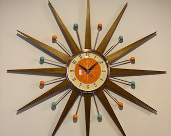 27 inch Hand Made Mid Century style Starburst Clock by Royale - Welby style Medium Teak Rays Orange & Turquoise Balls.