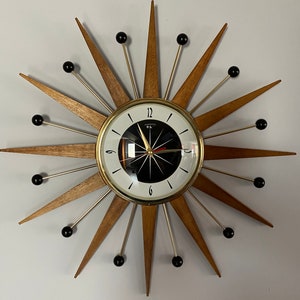 21 inch Hand Made Mid Century style Majestic Starburst Clock by Royale Medium Waxed Teak Rays Black White & Goldtone