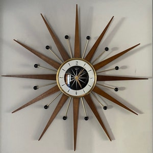 27 inch Hand Made Mid Century style Majestic Starburst Clock by Royale Medium Teak Rays, Black & Goldtone