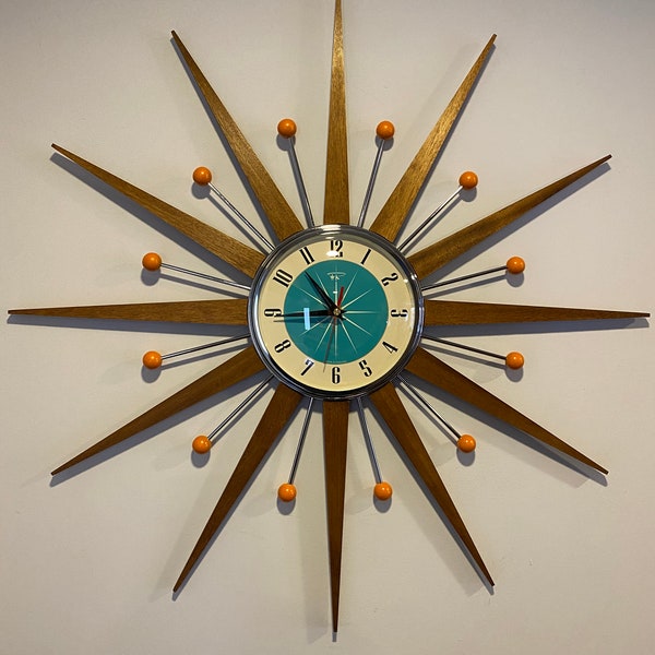 27 inch Hand Made Mid Century style Starburst Clock by Royale - Welby style in Chrome with Medium Teak Rays & with a Turquoise 1950's Dial