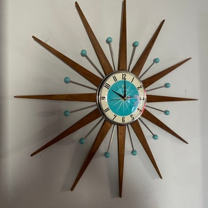 Top Selling Starburst Wall Clock by Royale Mid Century Modern style Chrome Silent Medium Teak Rays Turquoise Face Atomic Balls British Made image 2