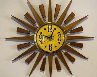 21 inch Hand Made Mid Century style Starburst Clock by Royale Medium Waxed Rays with a 1970s Yellow Face