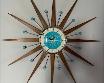 Top Selling Starburst Wall Clock by Royale Mid Century Modern style Chrome Silent Medium Teak Rays Turquoise Face Atomic Balls British Made