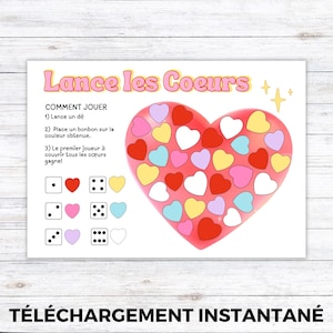 May include: A printable game board with a large heart filled with colorful heart shapes. The text "Lance les Coeurs" is at the top, with instructions and dice illustrations. The words "TÉLÉCHARGEMENT INSTANTANÉ" are at the bottom.