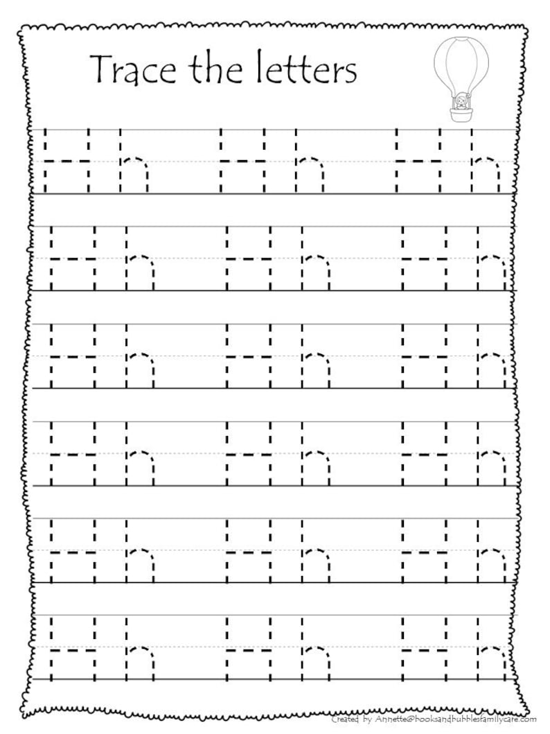 May include: Black and white worksheet with the text "Trace the letters" at the top. The worksheet has six rows of dashed lines with the letter "n" in each row. A black and white drawing of a hot air balloon is in the top right corner of the worksheet.