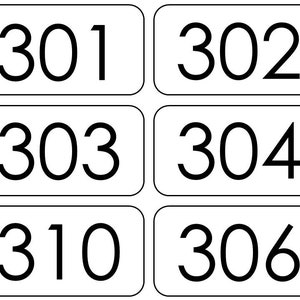 May include: A set of six white rectangular cards with black numbers. The numbers are 301, 302, 303, 304, 310, and 306.