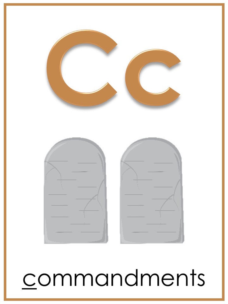 May include: An illustration of the letter C with two stone tablets, representing the Ten Commandments. The letter C is in a brown color and the tablets are gray.