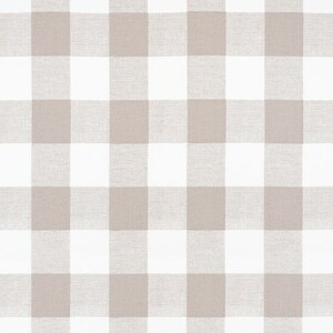 May include: A white and beige gingham fabric with a woven texture.