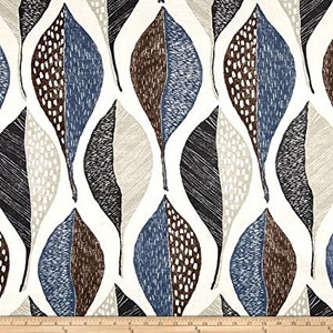 May include: A white fabric with a repeating pattern of stylized blue, brown, and black leaves. The leaves have a speckled pattern and are outlined in black.