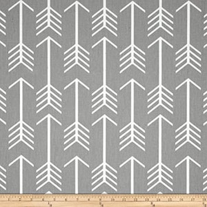 May include: Gray fabric with a white arrow pattern. The arrows are pointing to the right and are arranged in a repeating pattern.