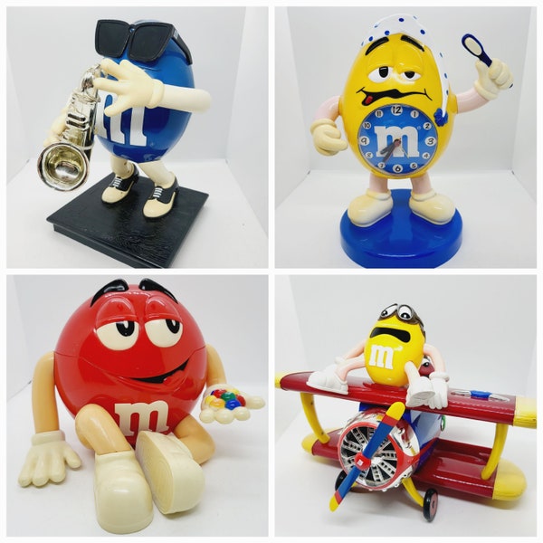 M&M's plastic figurine, toy figure, sweet dispenser, Yellow green Clock, Blue Saxophone player, red  aeroplane. vintage candy advertising