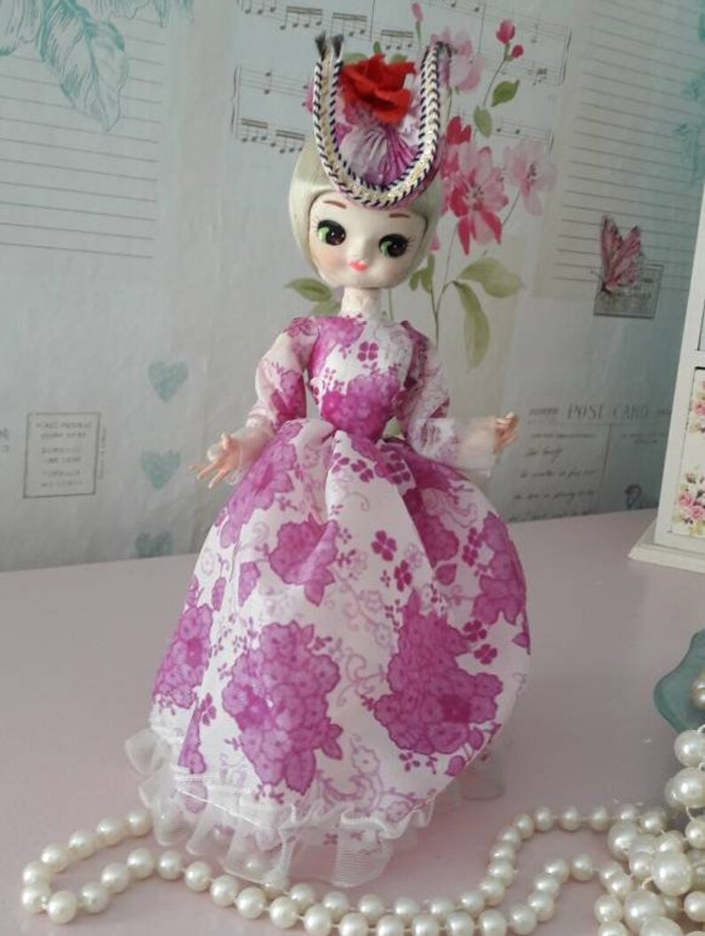 big head collectible dolls
