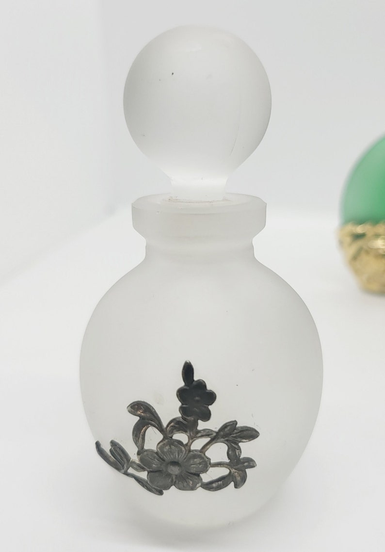 Frosted smoked glass small perfume bottle.