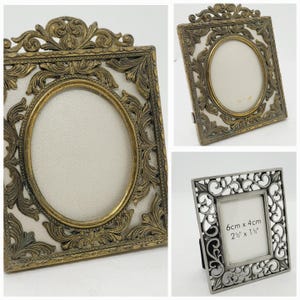 May include: Three ornate picture frames. Two are rectangular with oval openings, and one is square. The frames have intricate, vintage-style designs in gold and silver tones. The square frame has the dimensions 6cm x 4cm, or 2 ½" x 1 ½".