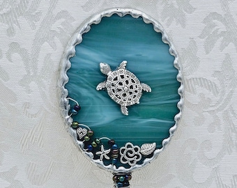 hand held vanity mirror with turtle