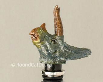 Fun & original herbivore! Triceratops dinosaur bottle stopper, hand painted - crystal eyes option. Picture is shown without crystal eyes.