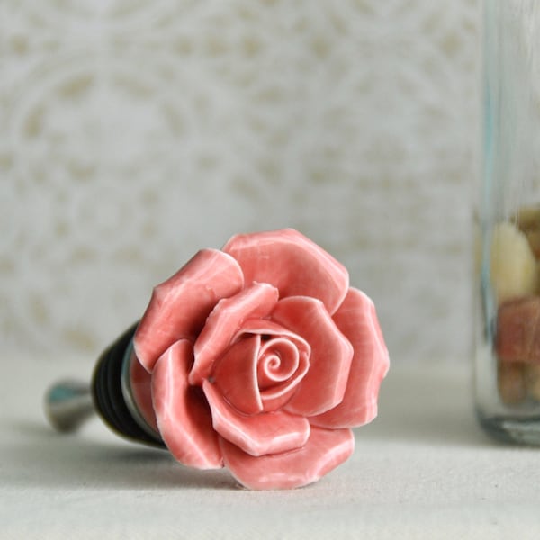 Hand made and hand painted ceramic rose bottle stopper. Completely unique and beautiful. Makes a brilliant gift!!