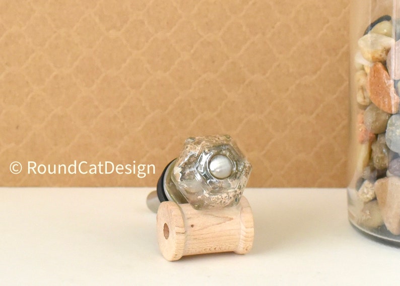 Depression Era mercury glass bottle stopper.