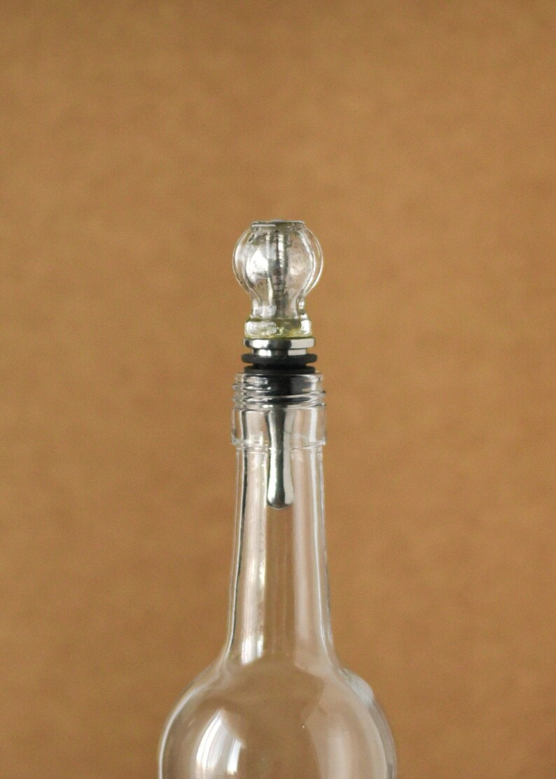 Depression Era mercury glass bottle stopper.