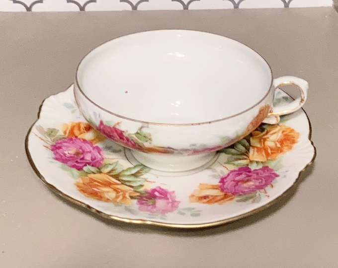Bavaria teacup and saucer, Schumann footed tea cup and saucer pink and yellow roses with gold trim