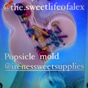 May include: A light purple, mouse-shaped silicone popsicle mould decorated with various colourful sprinkles, including gold, blue, and purple beads and rods. The text reads: Thank you so much @the.sweetlifeofalex Popsicle mould @irenessweetsupplies.