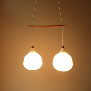 Mint condition refined oak wood satin glass mid century pendant 2 light hanging lamp Uno & Östen Kristiansson Luxus Sweden mid century 1960s