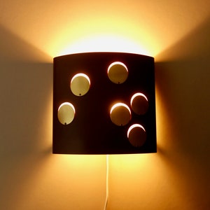 Rare very graphic all metal gold medals circles brass brown wall lamp light chocolate sconce mid century modern German design seventies
