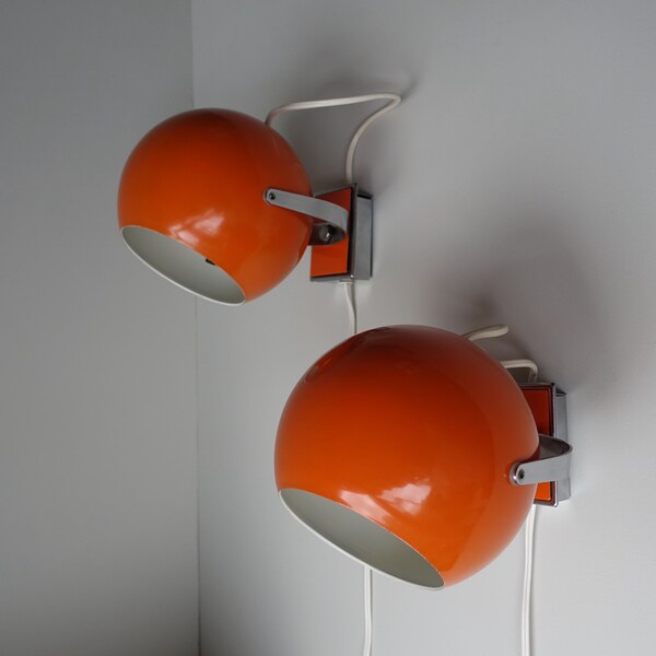 Pair set of 2 orange and chromed mid century modern metal eye ball wall lights lamps sconce adjustable round space age atomic 1970s sphere