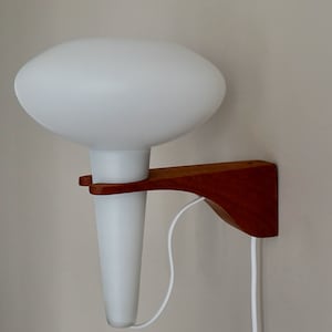 Mint condition refined classy Artimeta Holland milk white satin glass teak wood wall sconce light lamp mid century modern Scandinavian 1960s