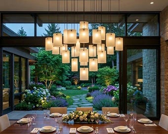 Chandelier with multiple shell shaped art glass pendant lights. Model name: SHELL