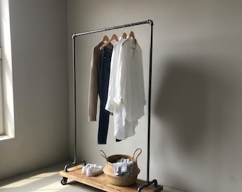 Modern industrial pipe and wood clothing rack | rustic industrial steel wood rolling clothing rack| retail /commercial clothing storage rack