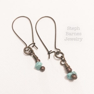 Free domestic shipping on 35USD . Turquoise earrings in bronze with copper details