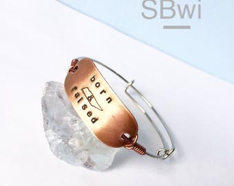 Free domestic shipping on 35USD . on 35USD .>/// Adjustable stainless steel bangle with hand stamped detail