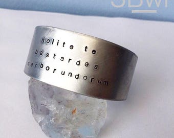 Handmade 'Nolite Te Bastardes' Silver Tone Cuff Bracelet