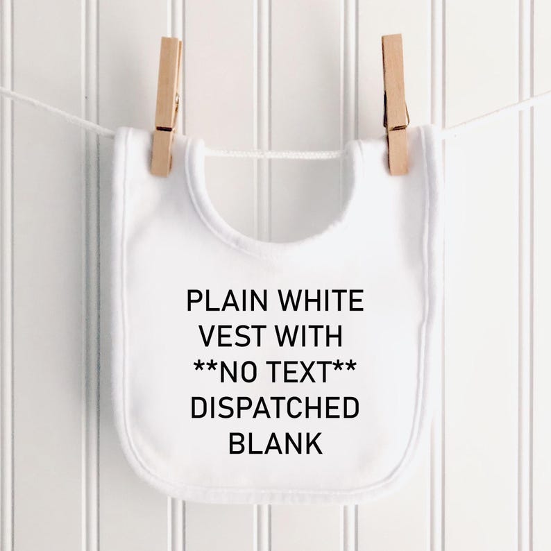 May include: A plain white baby bib hanging from a white string by two wooden clothespins. The bib features black printed text that reads: PLAIN WHITE VEST WITH **NO TEXT** DISPATCHED BLANK. The bib has a rounded shape and a smooth fabric texture.