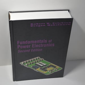 May include: A black book with the title "Fundamentals of Power Electronics, Second Edition" by Robert W. Erickson and Dragan Maksimovic. The cover features a circuit board with electronic components.