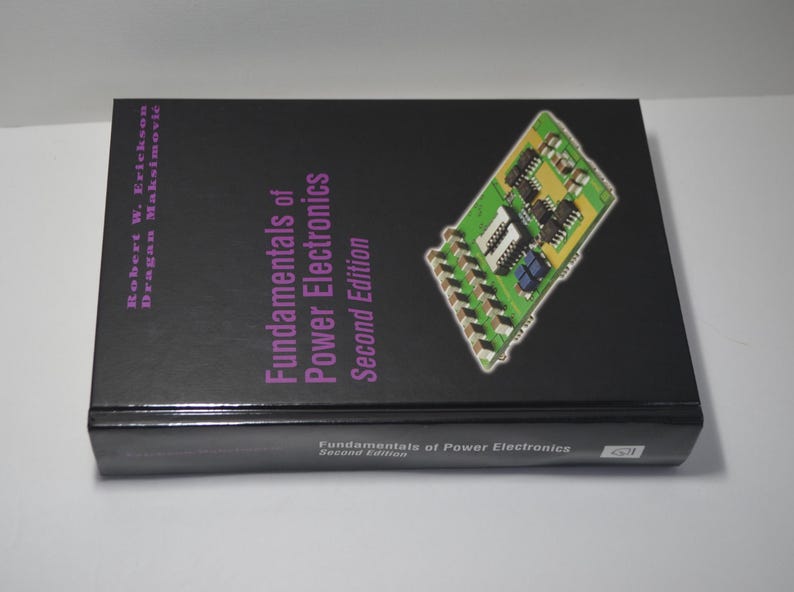 May include: A black book with the title "Fundamentals of Power Electronics, Second Edition" on the cover. The cover also features a green circuit board with electronic components.