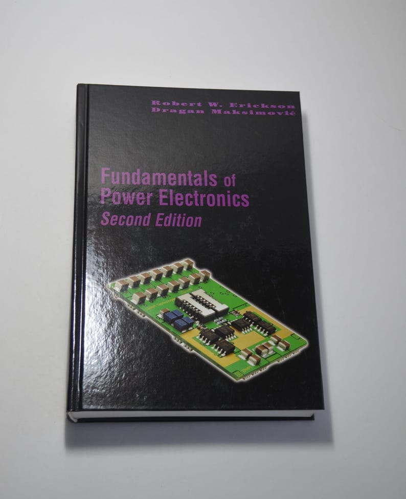 May include: A black book with a purple title that reads "Fundamentals of Power Electronics, Second Edition". The authors are Robert W. Erickson and Dragan Maksimovic. The cover features a close-up of a circuit board.