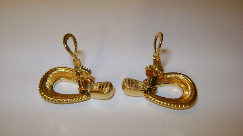 2 Pair lot of vintage gold tone clip earrings 1 pair is signed Goldette