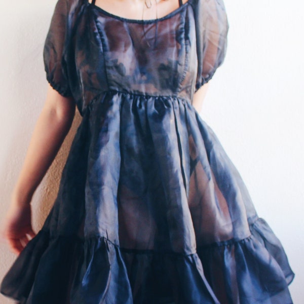 Enchanting Elegance: Sheer Black Babydoll Dress with Puffy Sleeves for Dark Days