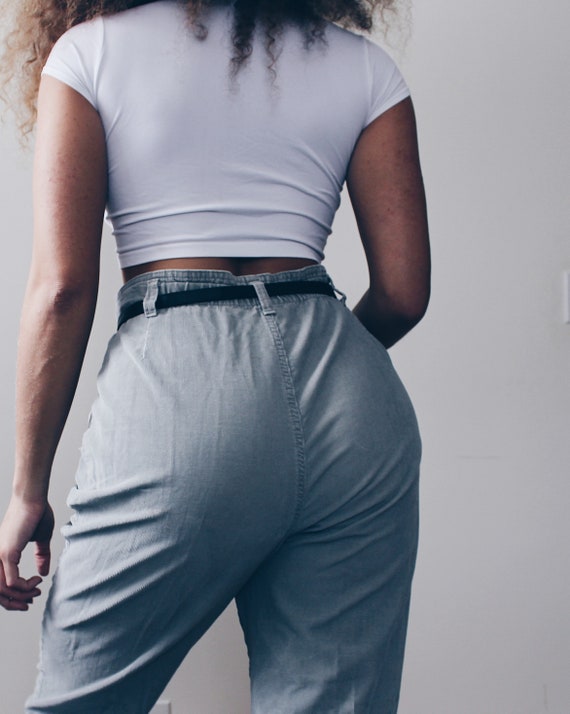 green high waisted corduroy pants