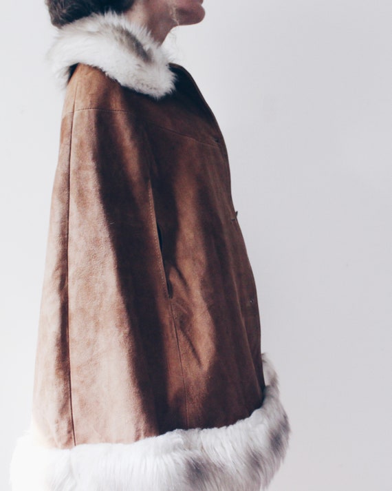 fur lined cape coat