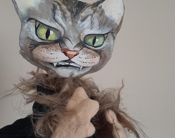 Gato marioneta de mano