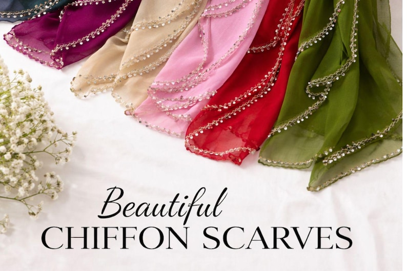 May include: A collection of chiffon scarves in various colors, including green, red, pink, and beige. Each scarf has a beaded trim along the edges. The text "Beautiful Chiffon Scarves" is displayed.