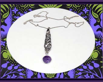 Handmade solid silver spoon pendant with an Amethyst gemstone